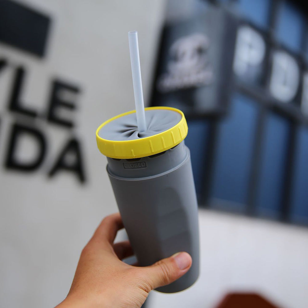 Sip on the go with our flip-up travel mug, now with a spill-resistant gasket!